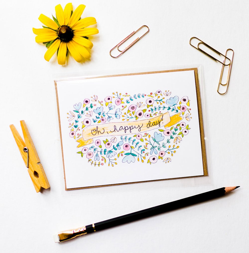 Biglietto d'auguri per laurea con illustrazione floreale