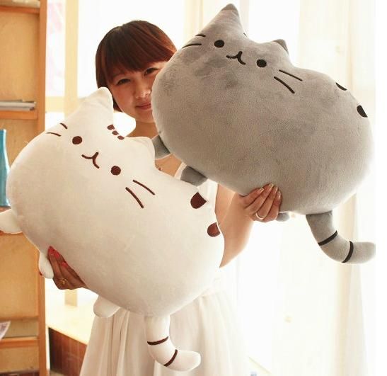 Soffici cuscini a forma di gatto