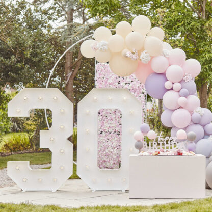 arco-palloncini-fiori-festa-rosa-viola