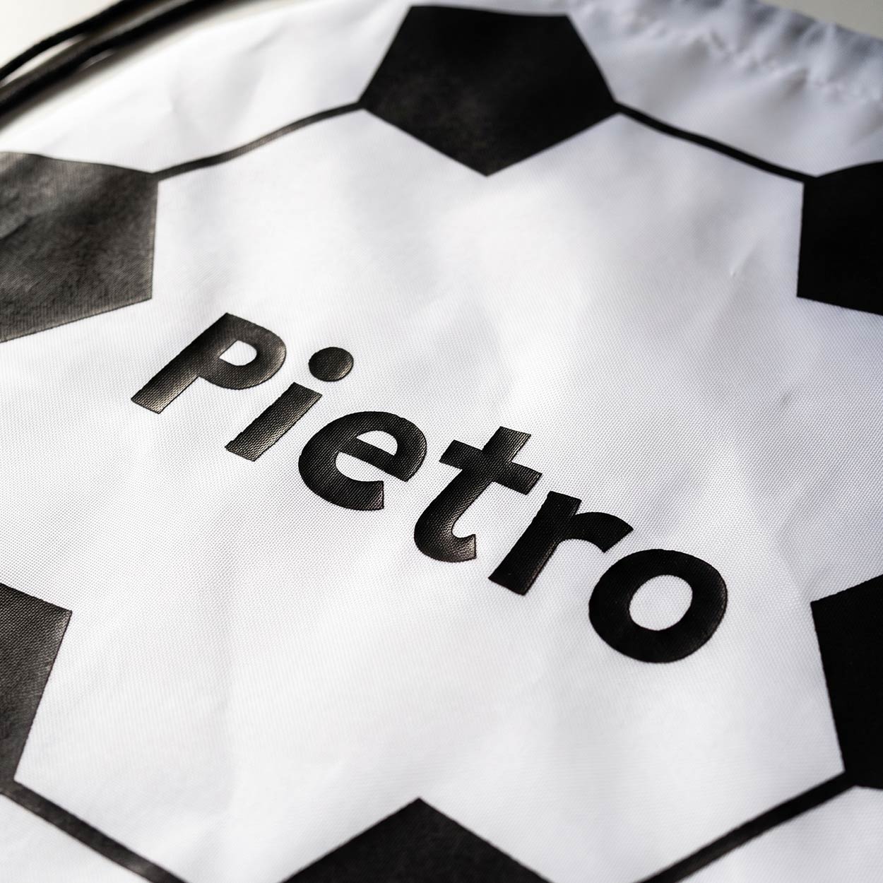 Anteprima personalizzazione nome sulla sacca pallone da calcio per bambini